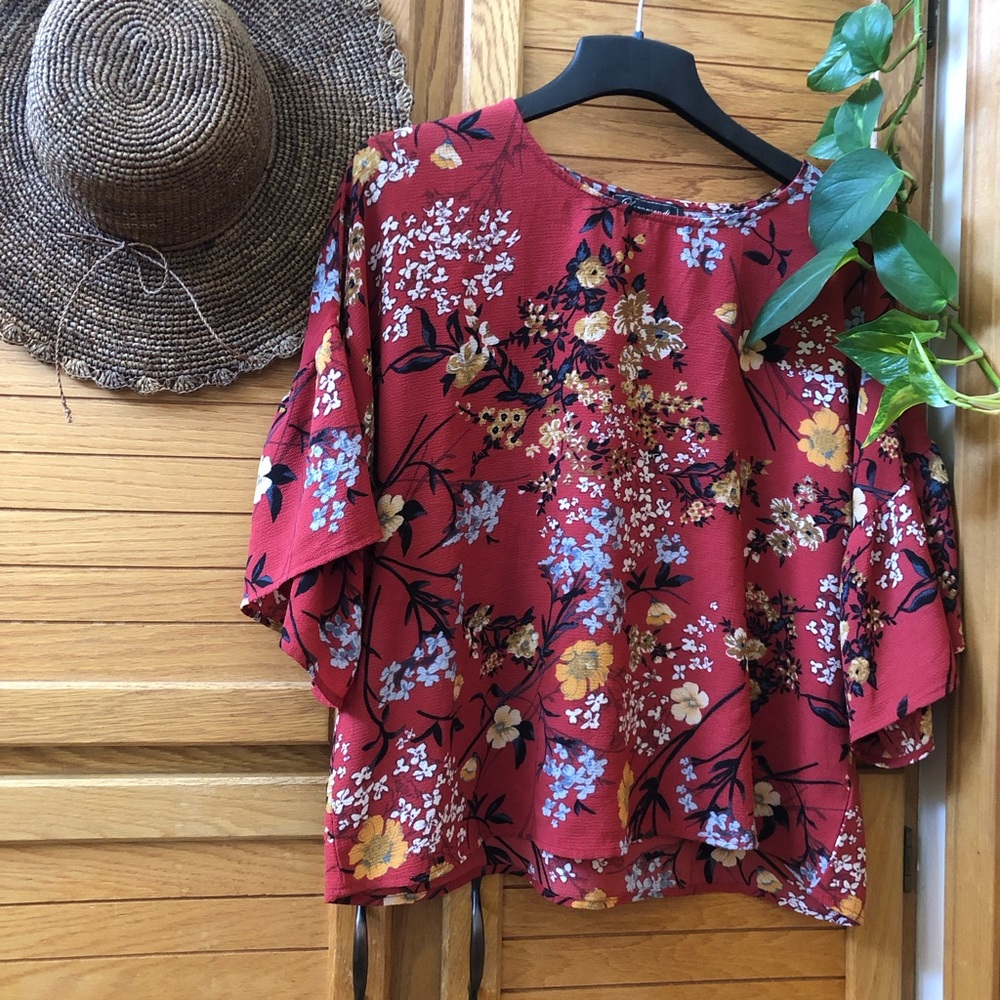 Casual lightweight bell sleeve blouse. Boxy fit.